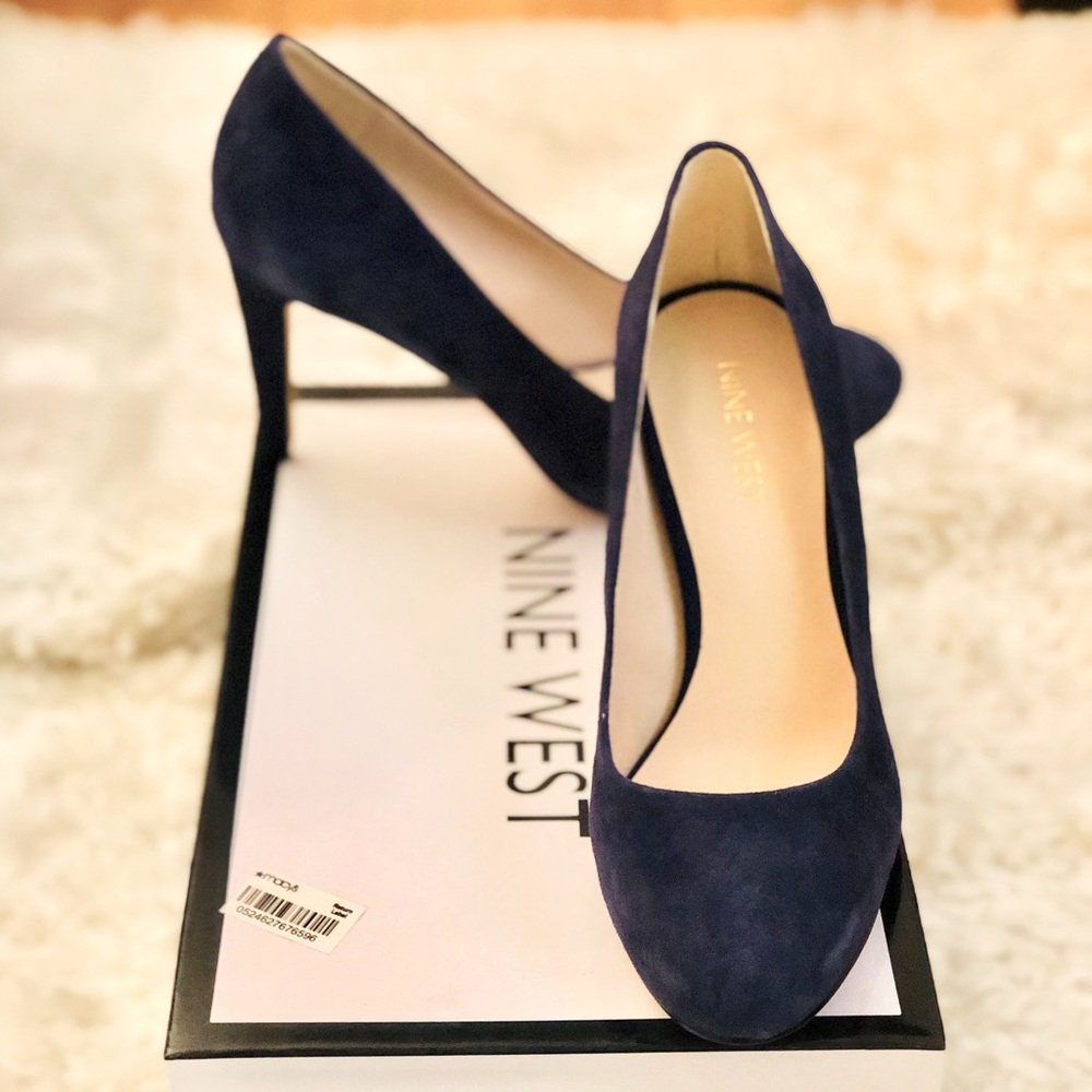 Brand new, never worn navy blue suede heels. 2.5 inch heels. Size 5.5.